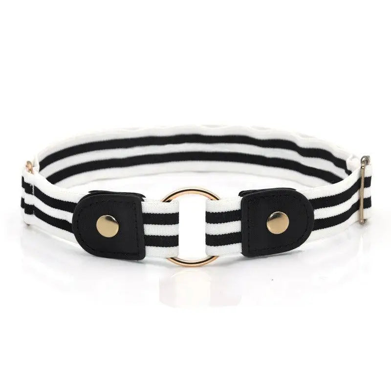 Black and white striped elastic belt with gold ring detail paired with Floral Dress