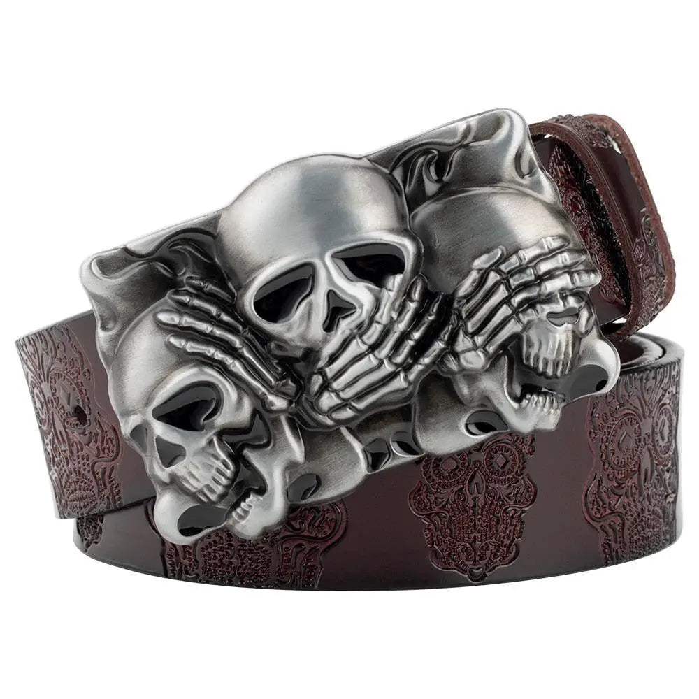 Black leather belt with embossed skull pattern and a prominent skull buckle