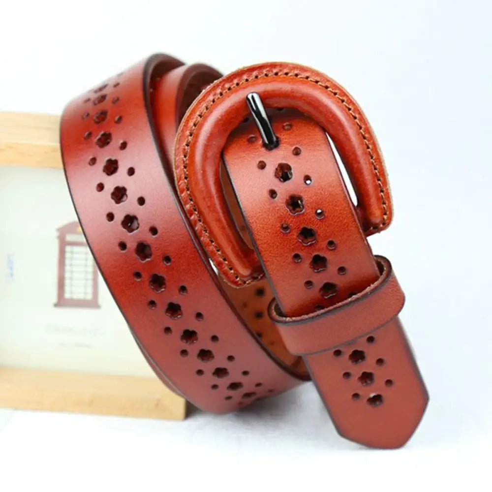Mia Belt with circular cutouts and decorative perforations on brown leather