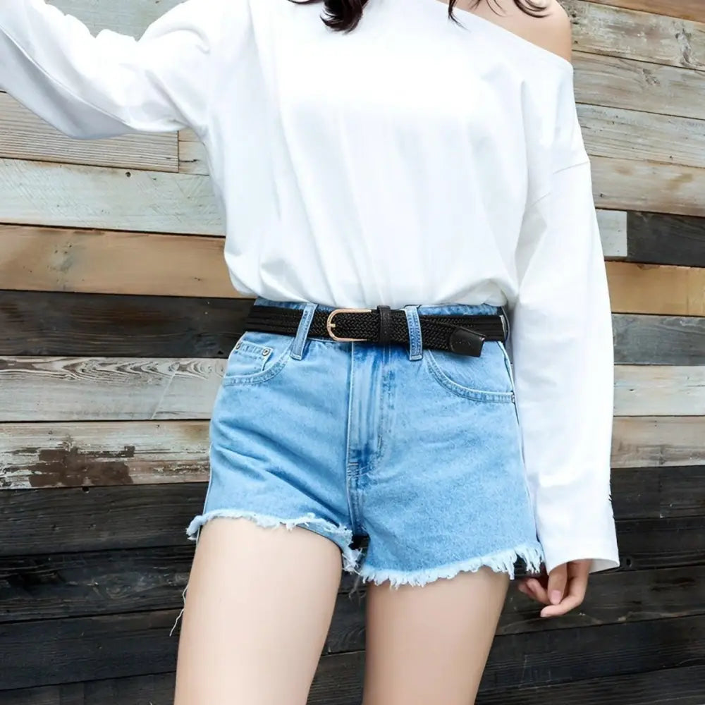 Adelina Belt with Pink Leather Accents paired with denim shorts with frayed edges