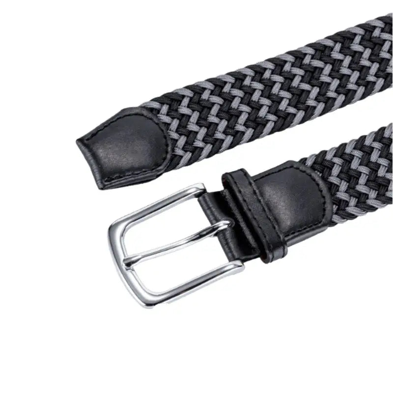 Braided gray and black elastic belt with leather accents and silver buckle detail
