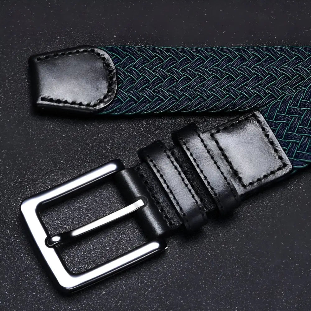 Green braided elastic belt with leather accents and silver buckle for a stylish accessory