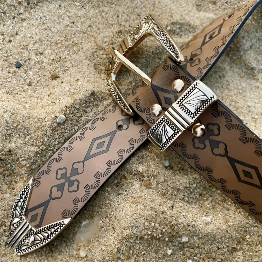 Embossed burgundy leather western belt with silver buckle and tip for Maeda Western Belt collection