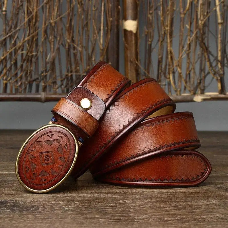 Brown leather sciria belt with a stylish patterned buckle from the Sciria Belt Collection