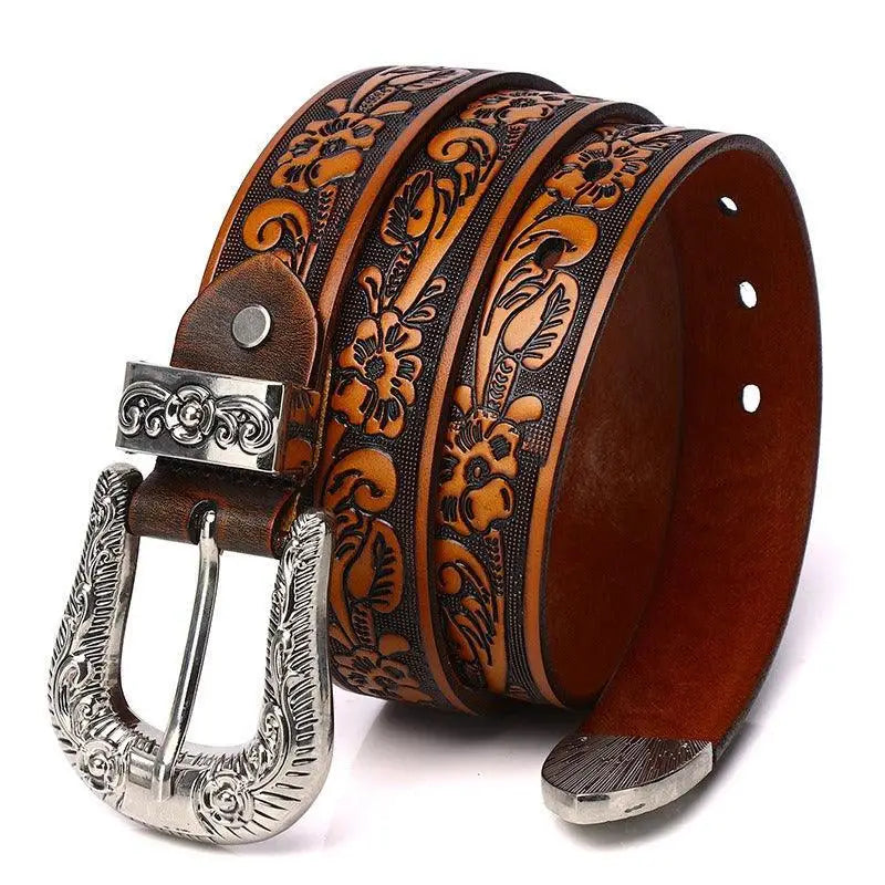 Yatokya belt featuring embossed brown leather and an ornate silver buckle