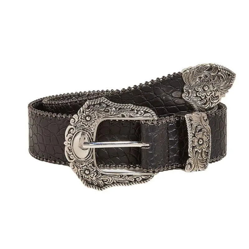 Black crocodile-pattern leather belt with an ornate silver buckle for elegant style