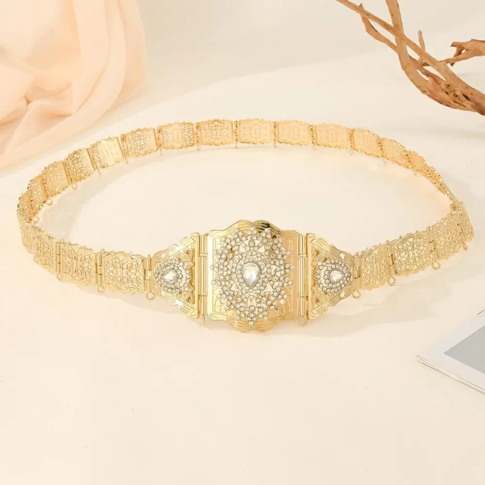 Ornate gold metal belt with rhinestones from Elegant Gold Tone Metal Belt with Rhinestones