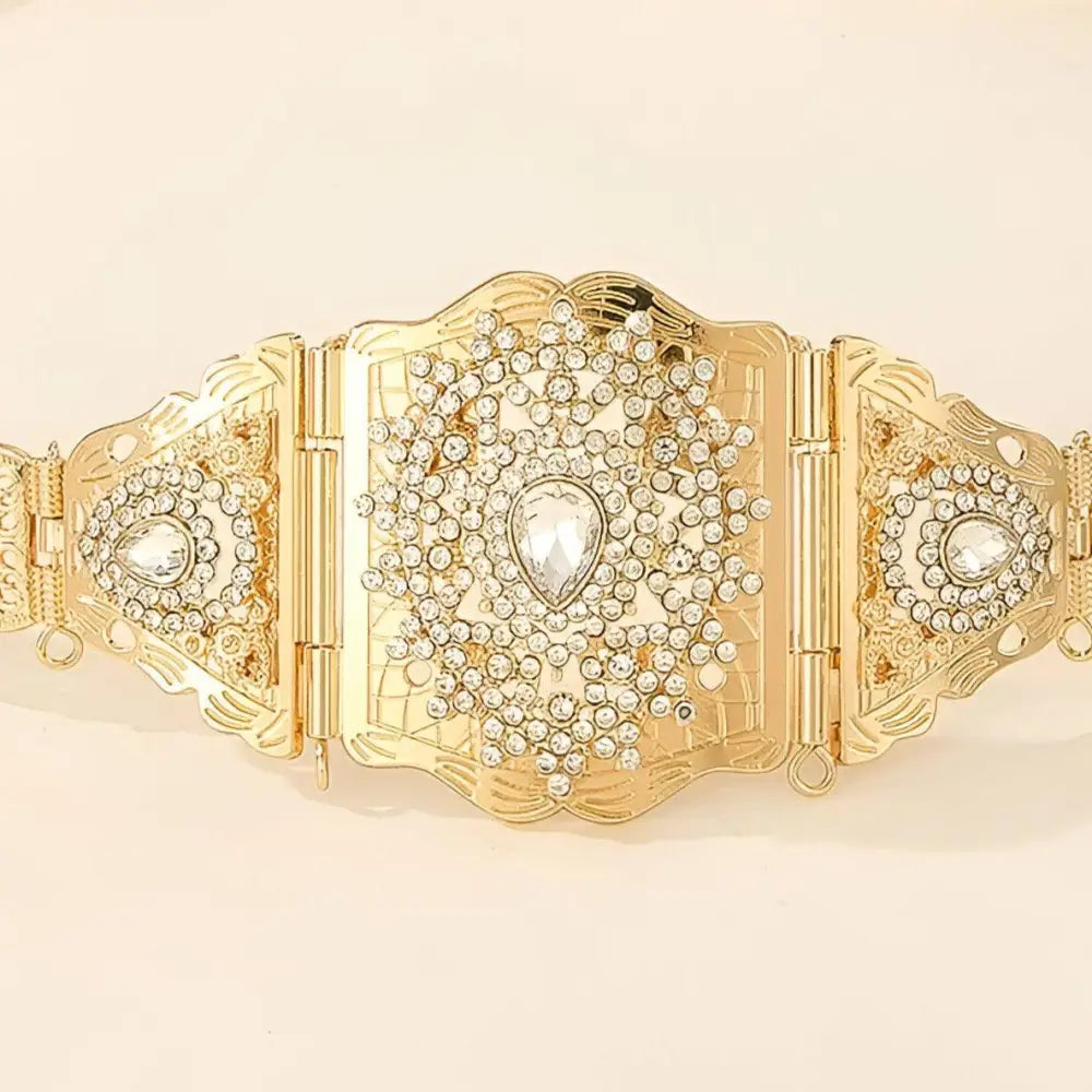Elegant gold-tone metal belt with rhinestone embellishments for sophisticated fashion style