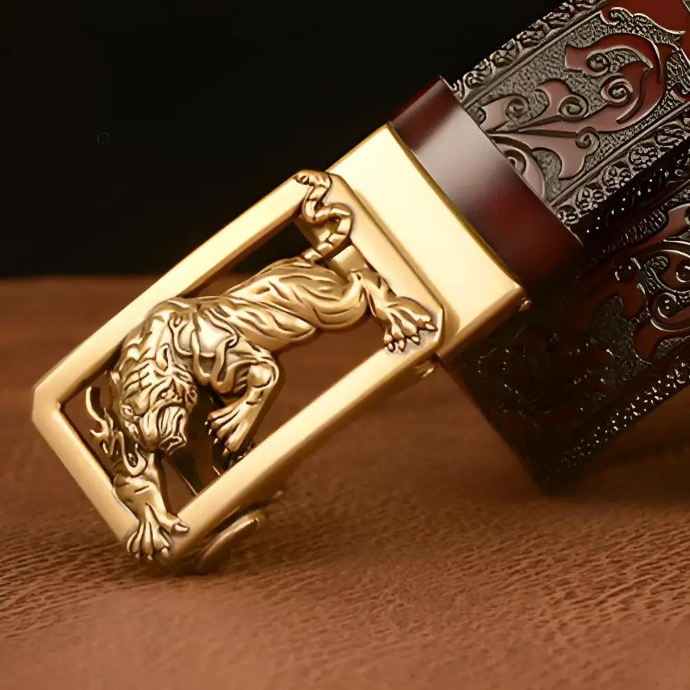 Ornate tiger belt buckle on embossed leather belt product image