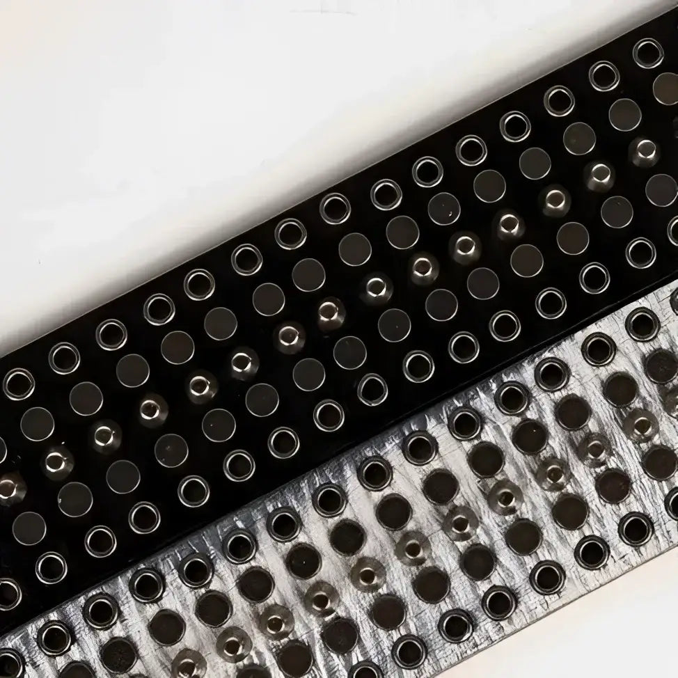 Genuine leather studded belt with grommets for a stylish and durable accessory
