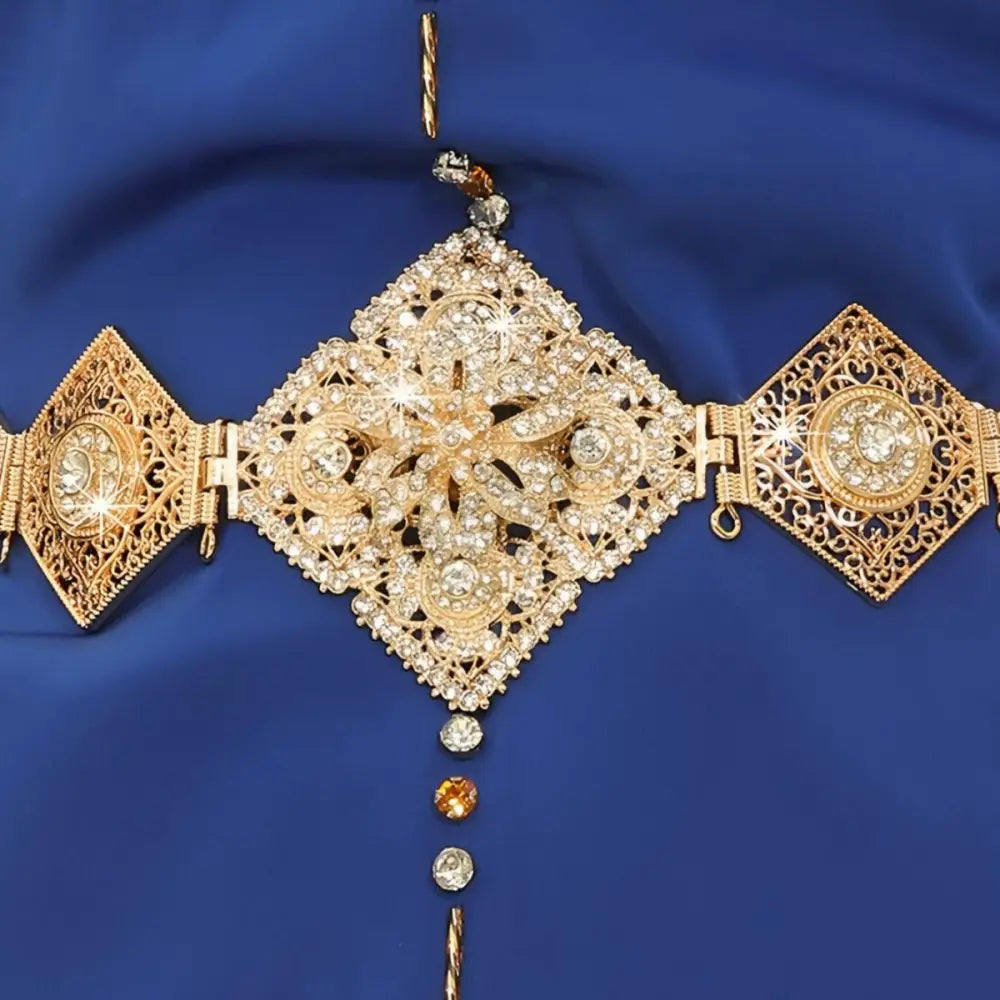 Ornate gold and rhinestone Moroccan belt with intricate embellishments for elegant style