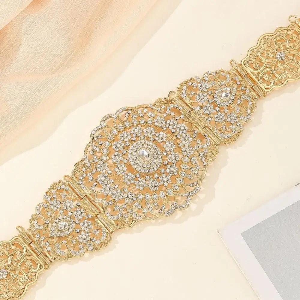 Ornate gold-tone rhinestone Moroccan belt with intricate detailing for elegant fashion
