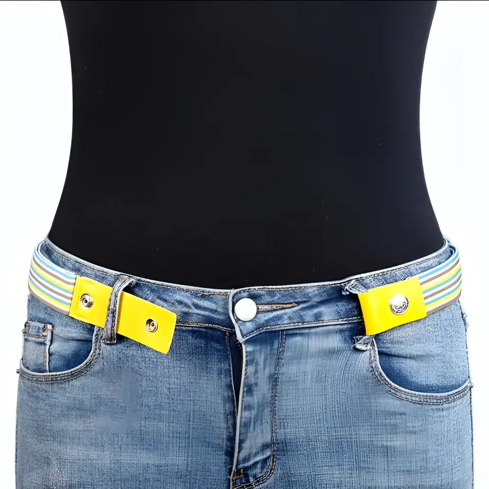 Jeans with yellow buckle belt and striped elastic belts in the product display