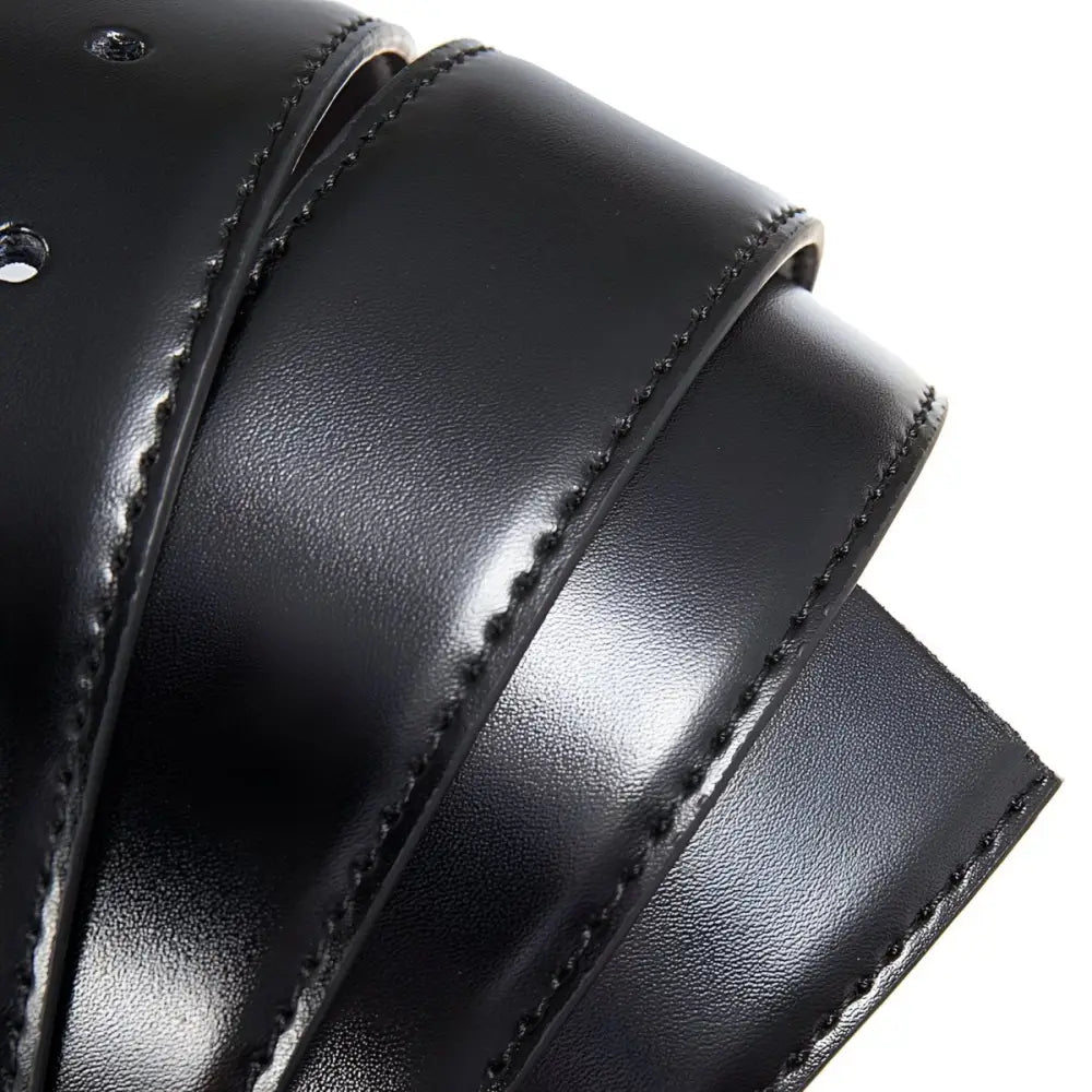Rolled black leather belt shown in Coiled Black Leather Belt Set for everyday wear