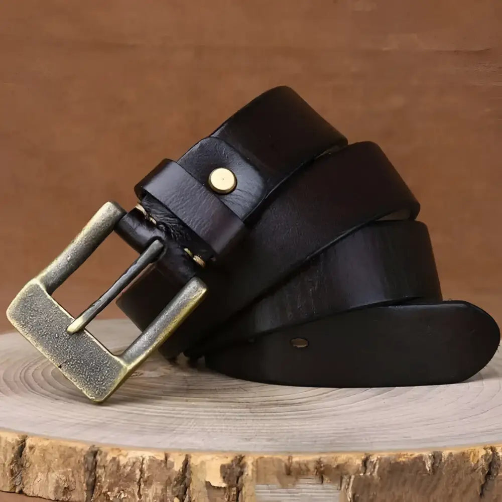 Rolled dark leather belt with brass buckle from Ramthia Men’s Leather Belts collection
