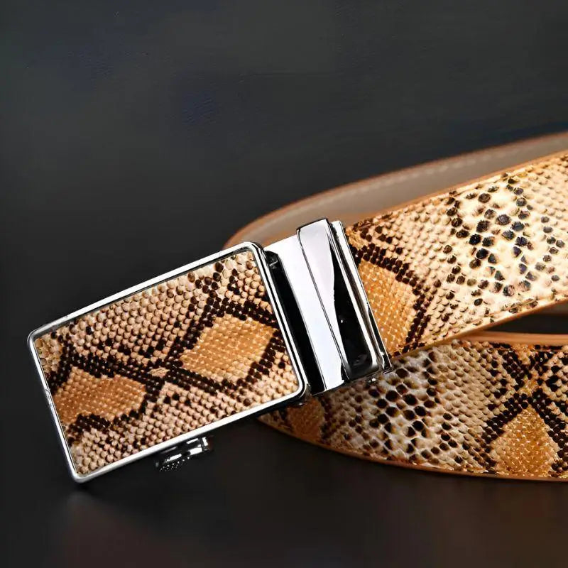 Snakeskin-patterned belt with a silver buckle for stylish accessory enhancement