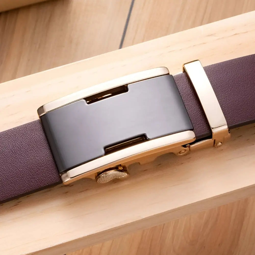 Full-grain leather belt with gray and gold buckle for sophisticated style