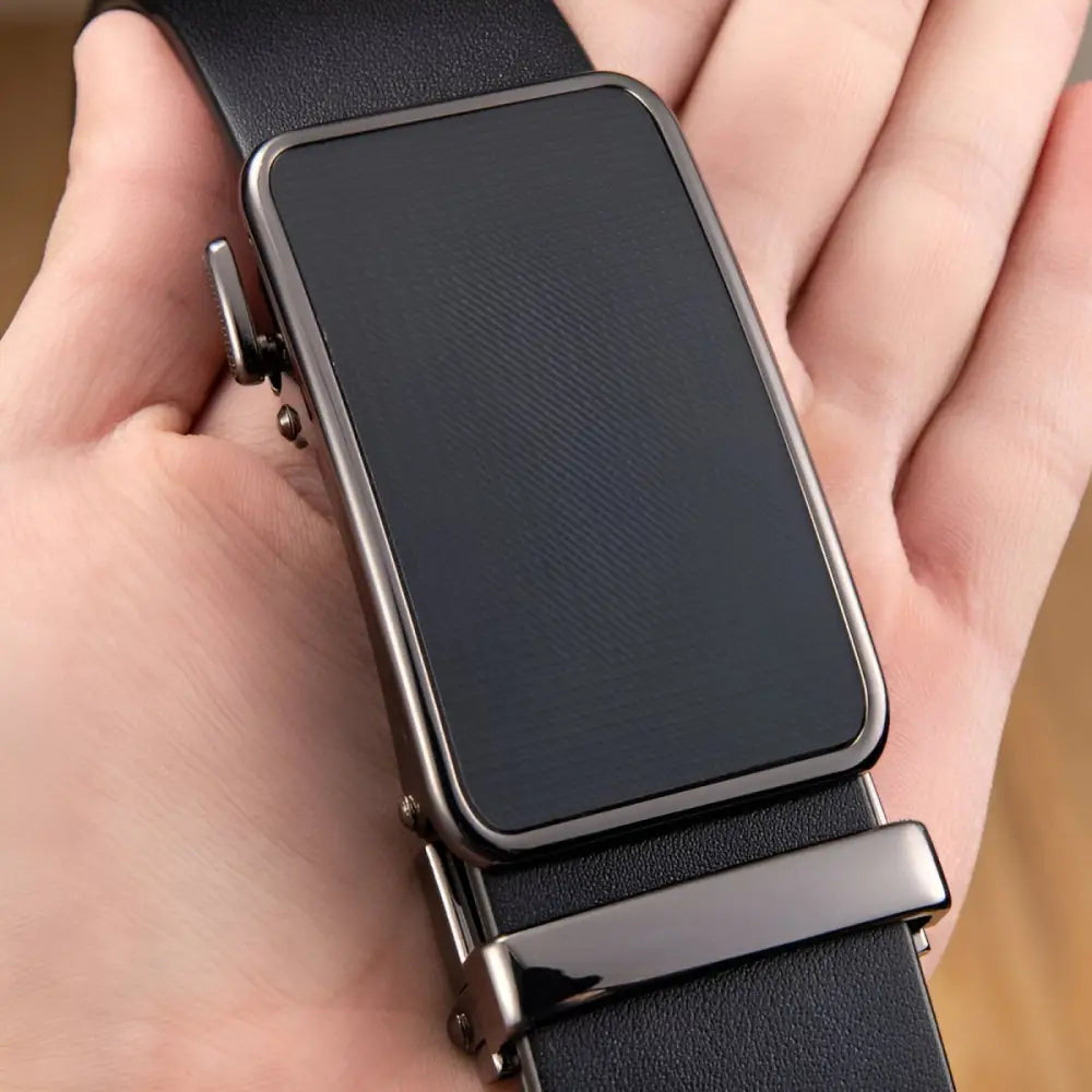 Black grain leather dress belt featuring Mauro automatic buckle and rectangular dark-screened buckle