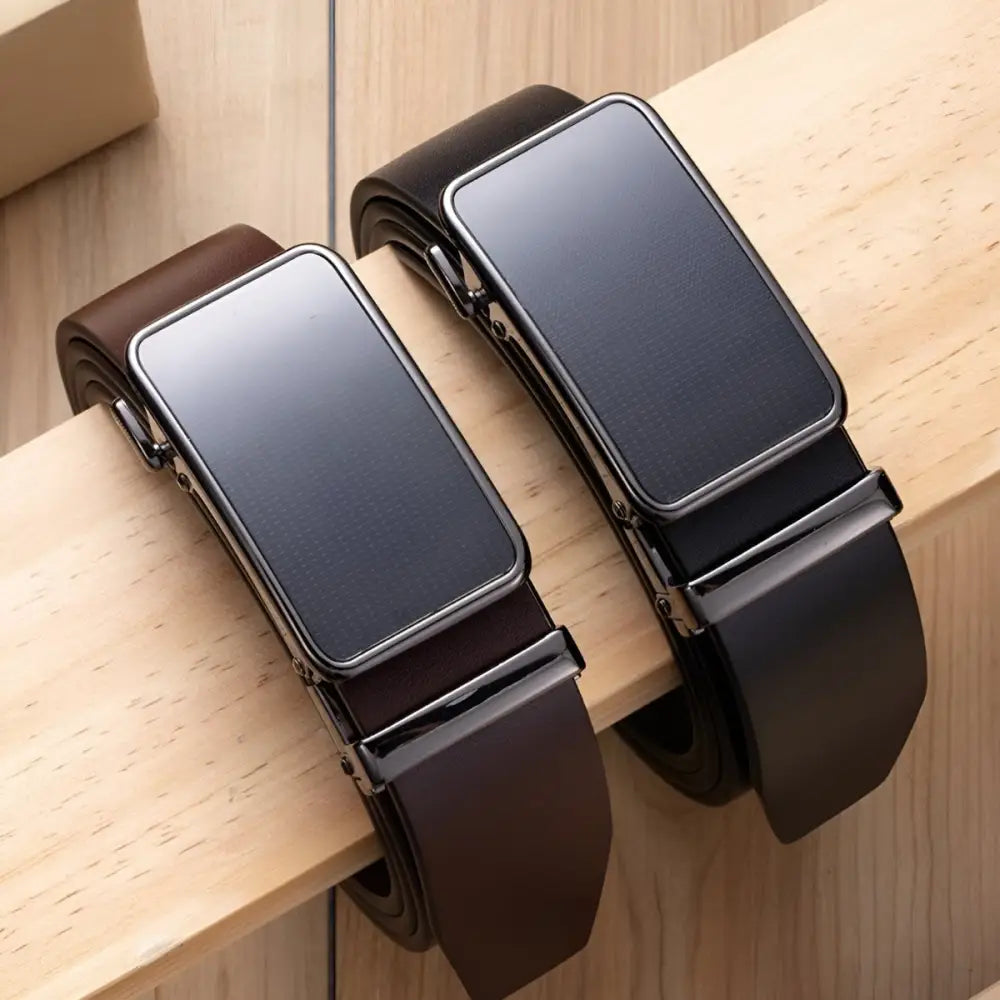 Two grain leather dress belts featuring Mauro automatic buckle for stylish, durable wear