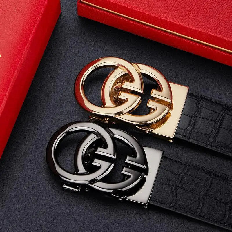 Two designer leather belts with interlocking G buckles in black and gold
