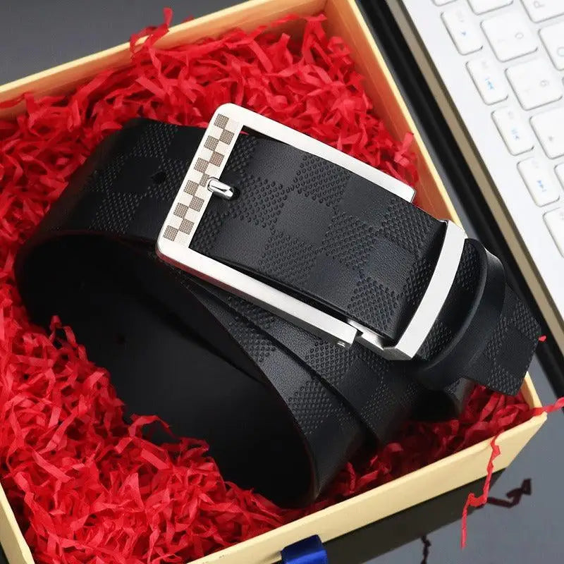Reversible suit belt with checkered and black leather designs and silver buckle