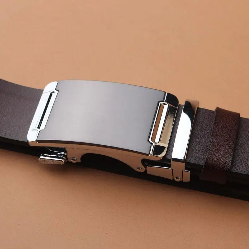 Brown leather belt with silver buckle for a classic style accessory