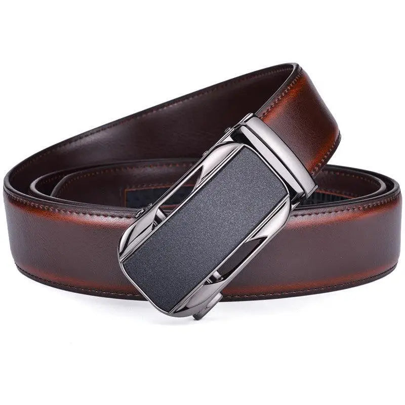 Brown leather ratchet belt with a black and silver metal buckle for men’s fashion