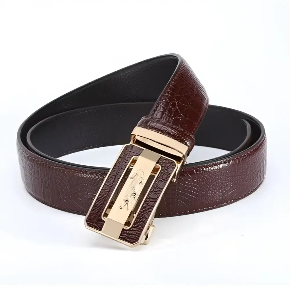 Tahir Belt with Crocodile Leather and Jaguar Buckle Designs featuring a brown leather belt with gold buckle