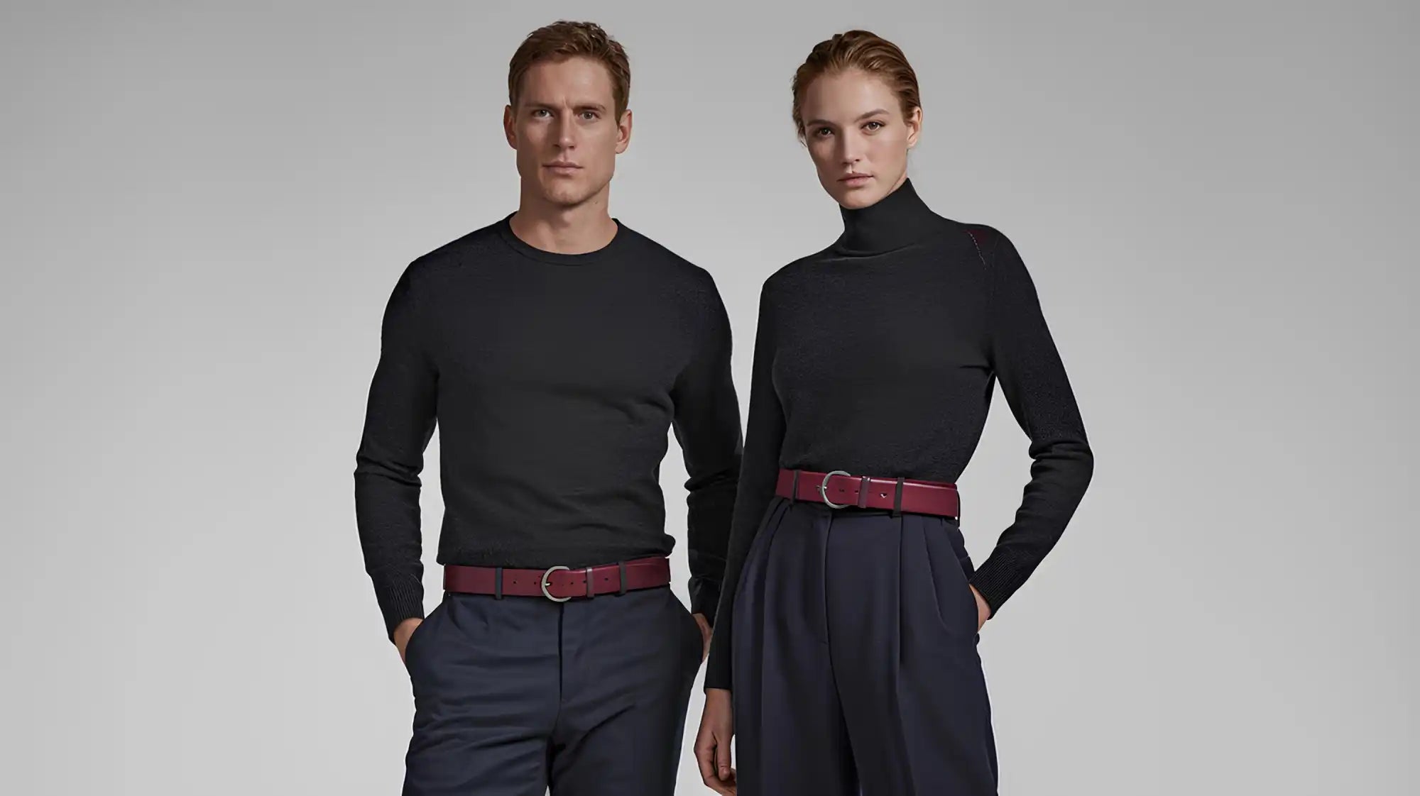 Two models wearing matching burgundy belts.