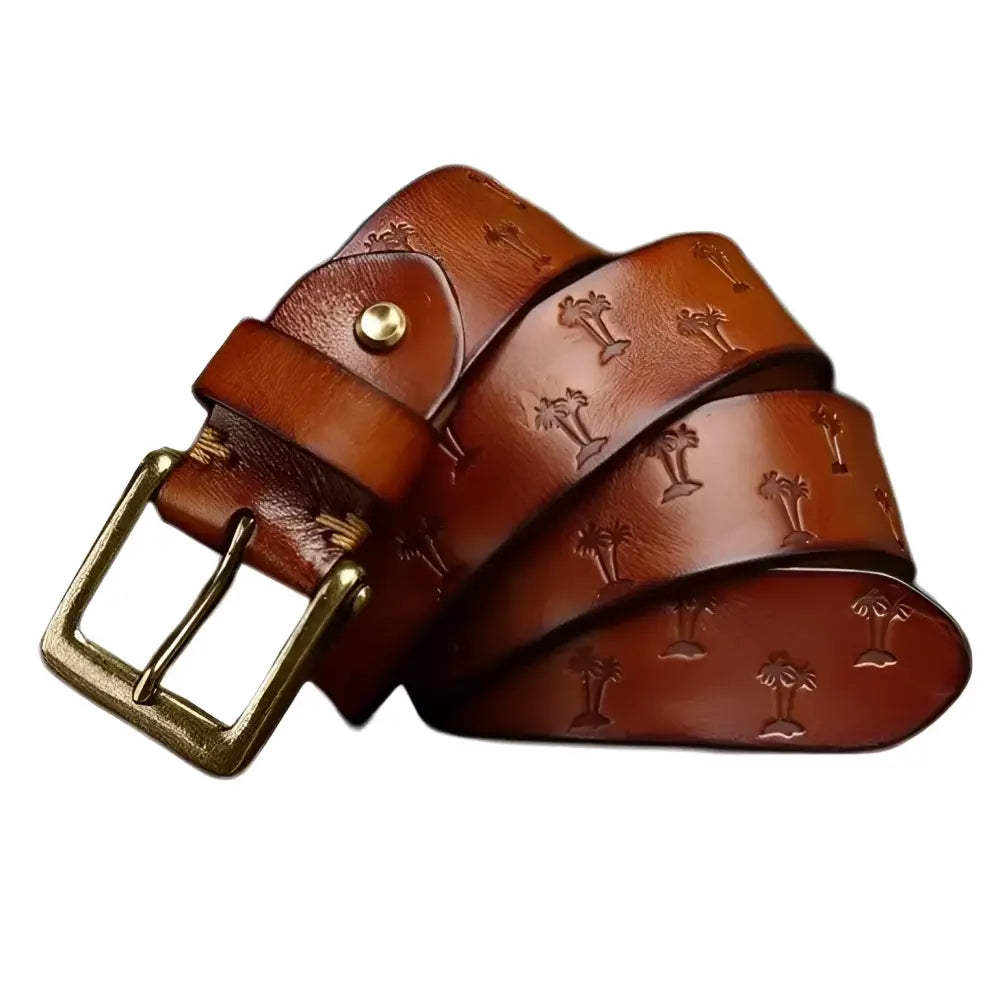 Brown women’s leather belt with palm tree pattern and metal buckle for stylish outfits
