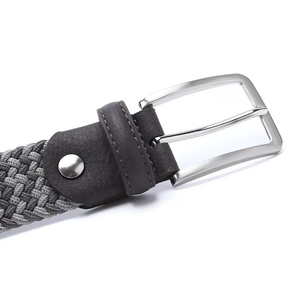 Braided gray elastic belt with leather accents and silver buckle for versatile fashion