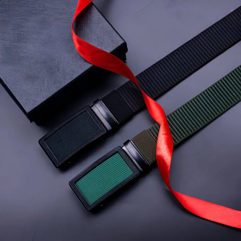 Assorted ratchet belts with automatic buckles displayed with gift packaging