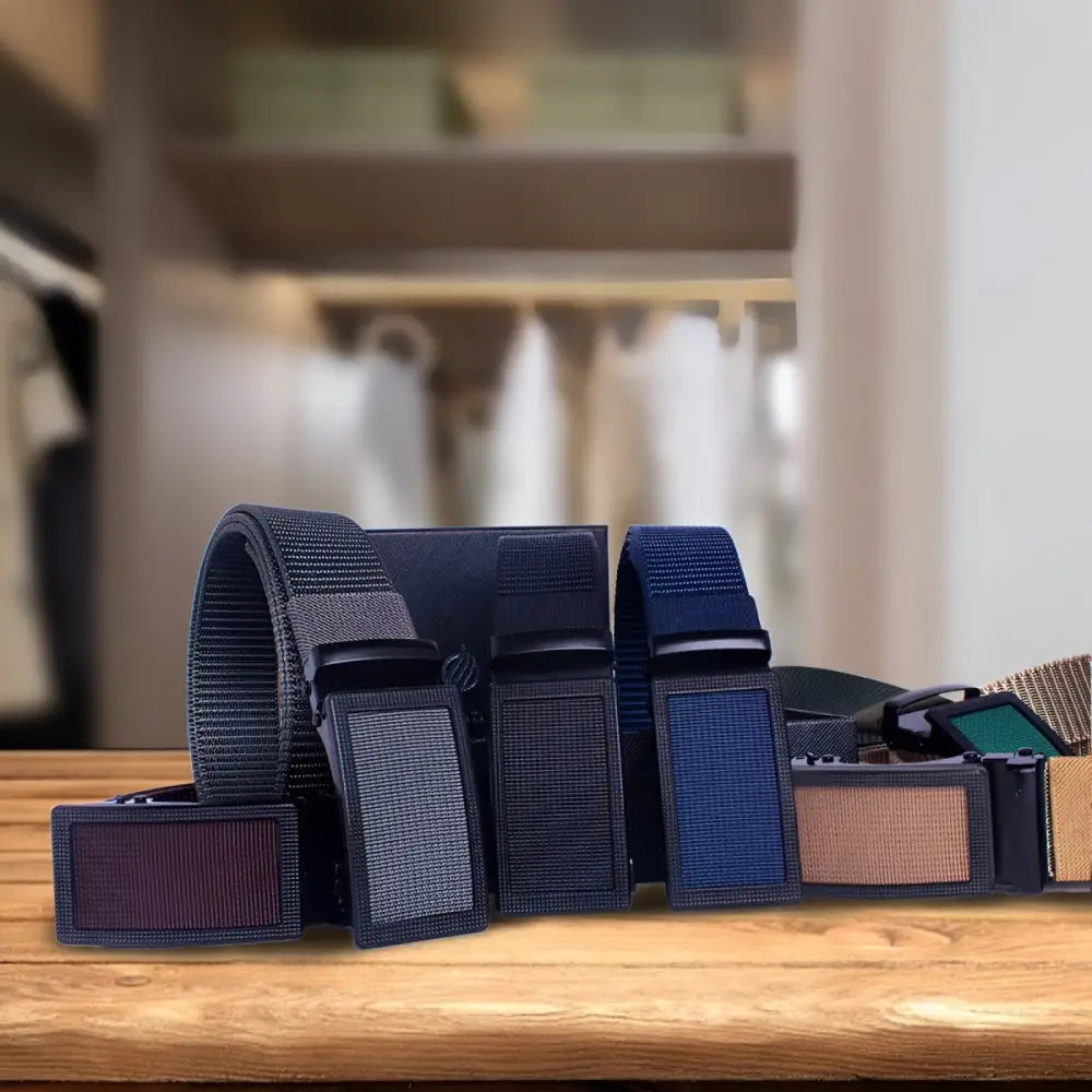 Assorted ratchet belts with automatic buckles displayed in gift packaging