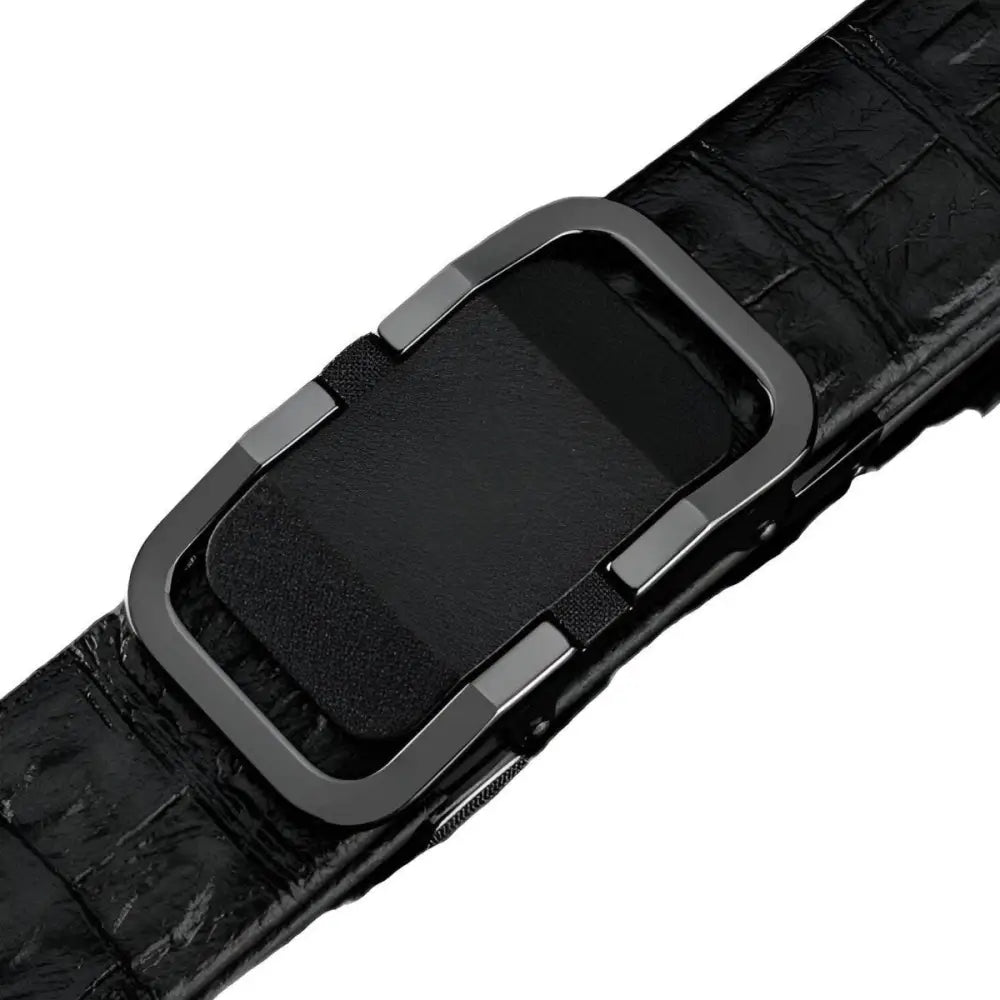 Black crocodile-pattern leather belt with a gold metal buckle