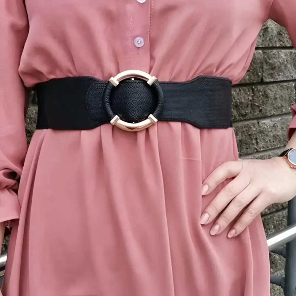 Black elastic belt with a gold circular buckle suitable for dresses and outfits