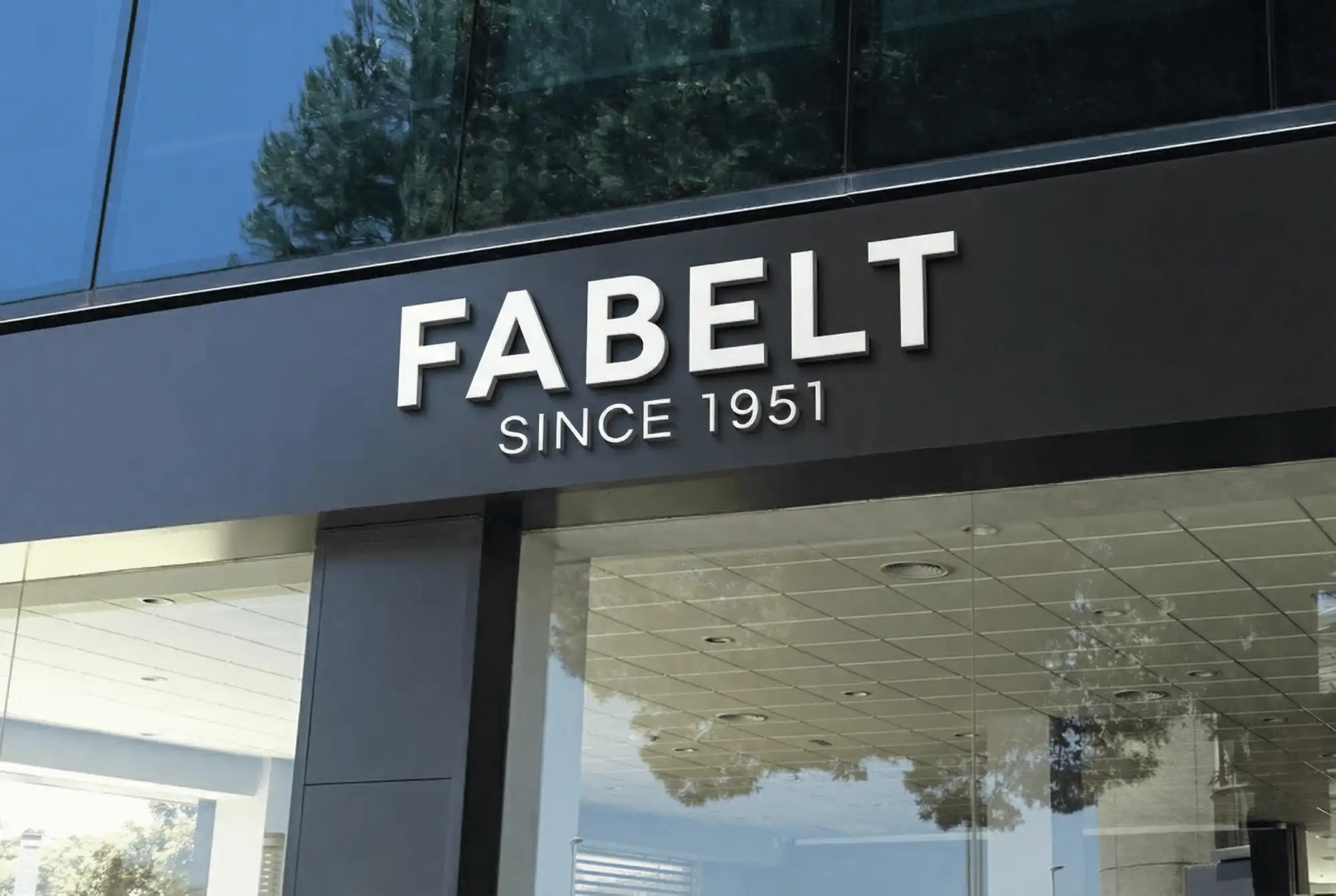 Black fabelt storefront sign with white lettering and ’since 1951’’ beneath it.