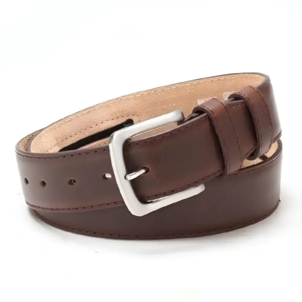 Black faux leather belt with silver buckle designed for travel and personal style