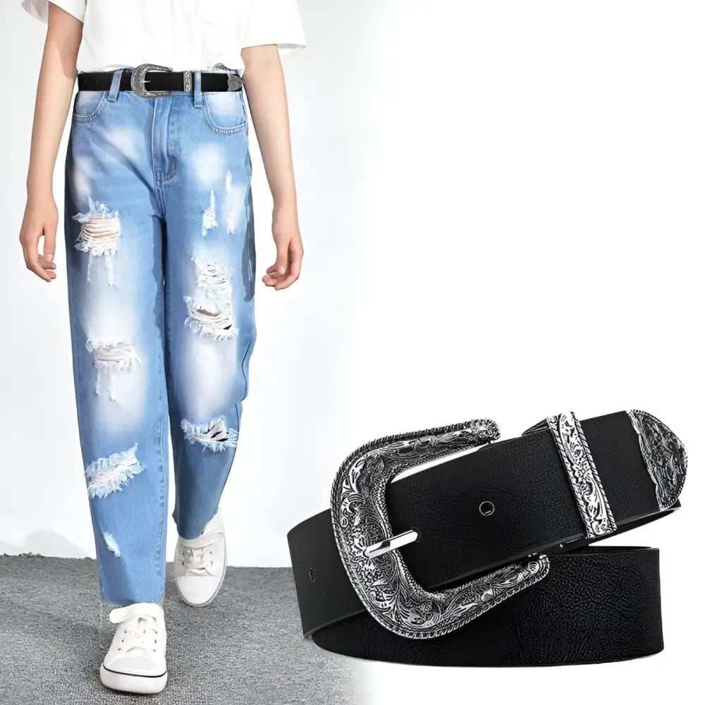 Black leather belt featuring an ornate silver buckle for a stylish and sophisticated look