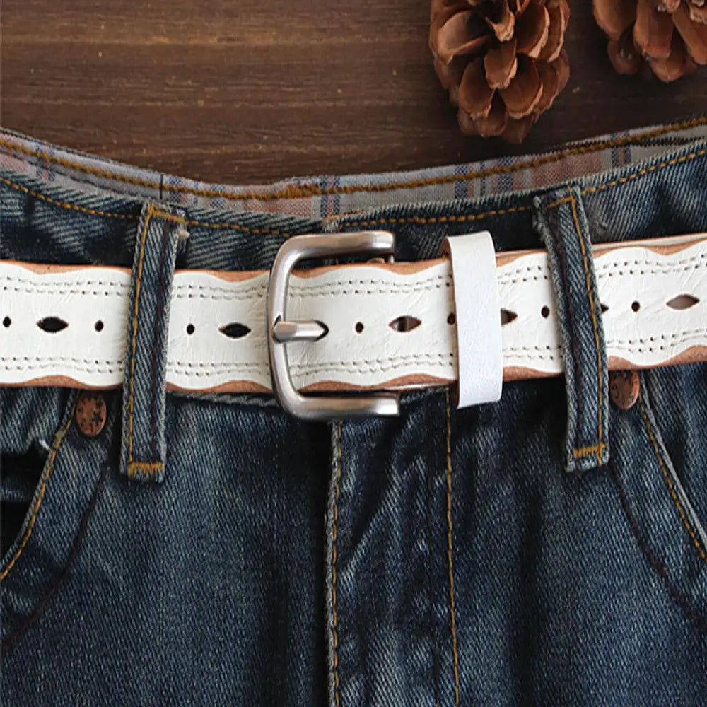 Blue jeans paired with a boho chic leather belt from the Boho Chic Leather Belt Collection
