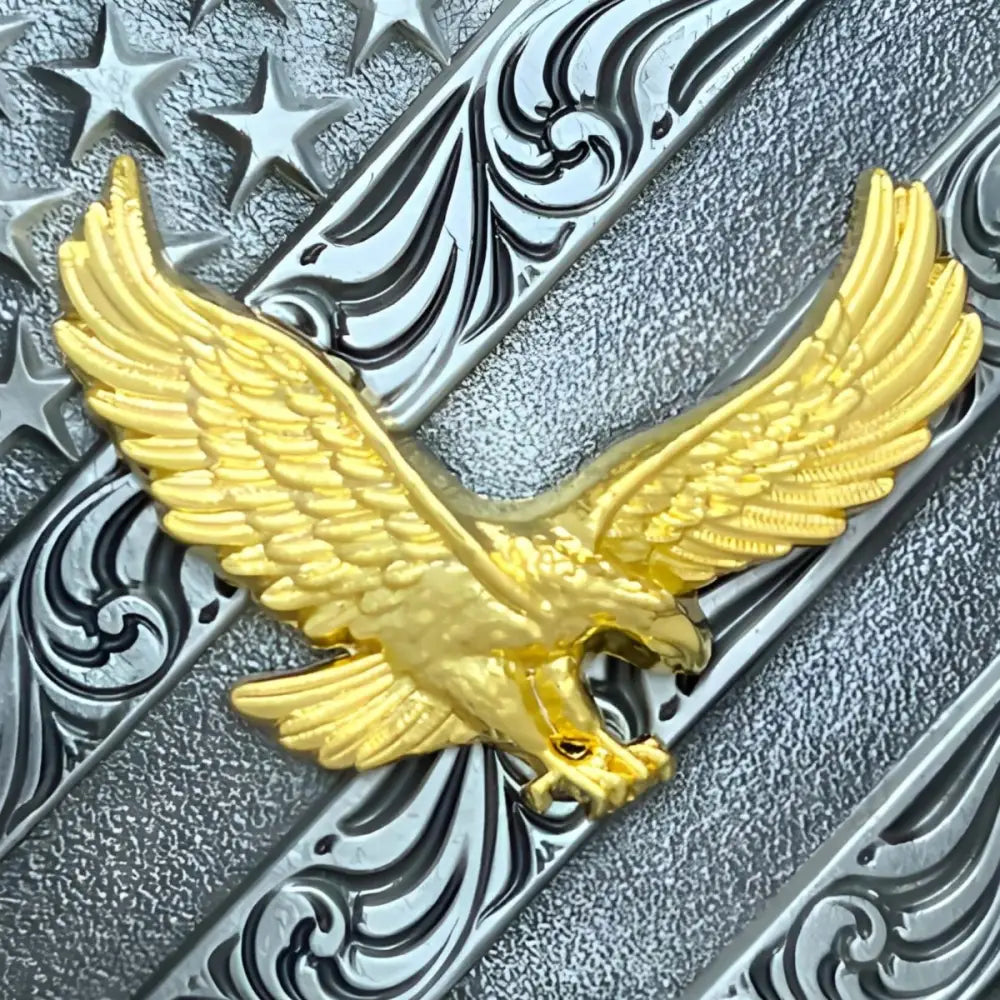 Golden Eagle on engraved American flag belt buckle showcasing detailed design