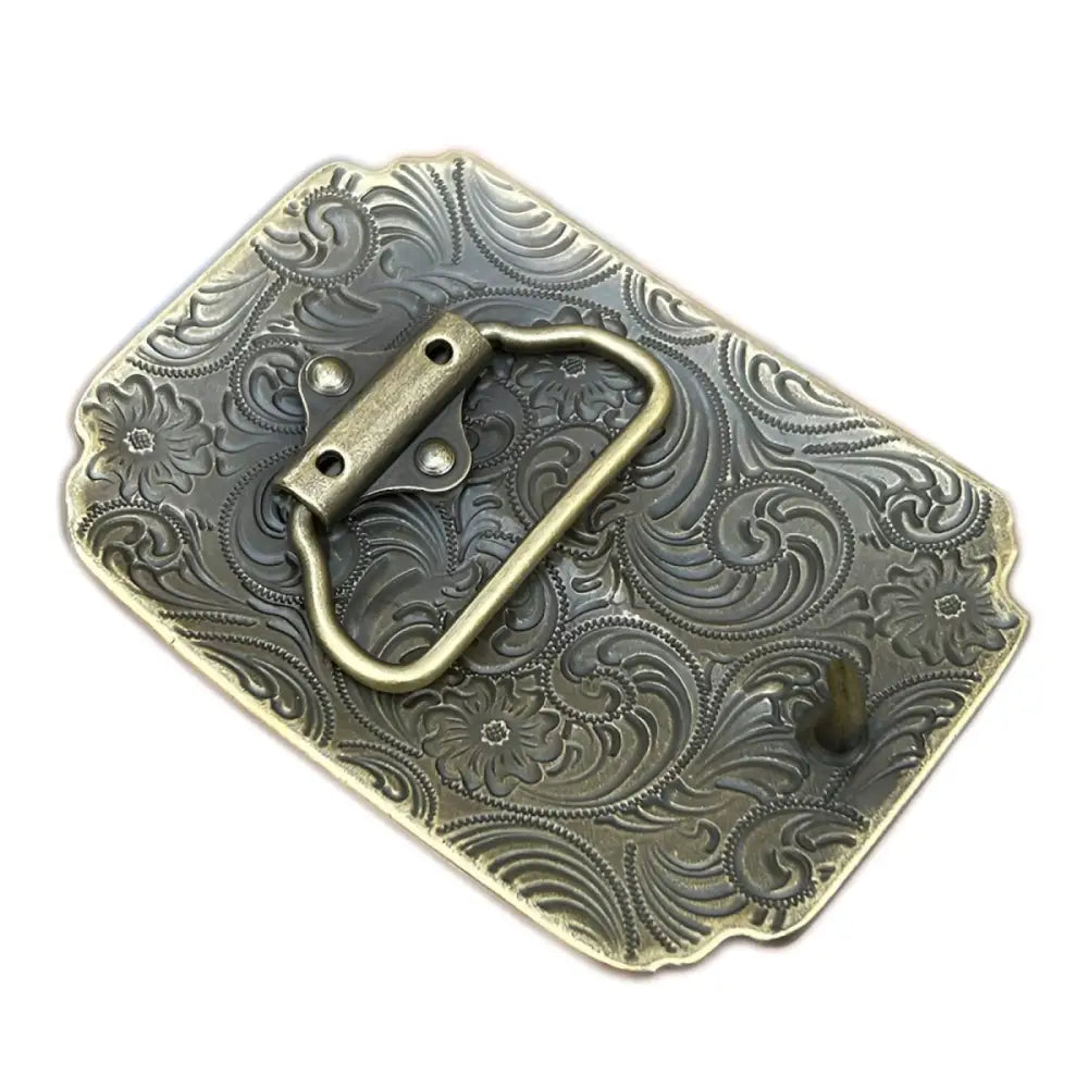 Ornate metal belt buckle from Texas Longhorn Belt Buckles in Silver and Bronze Colors