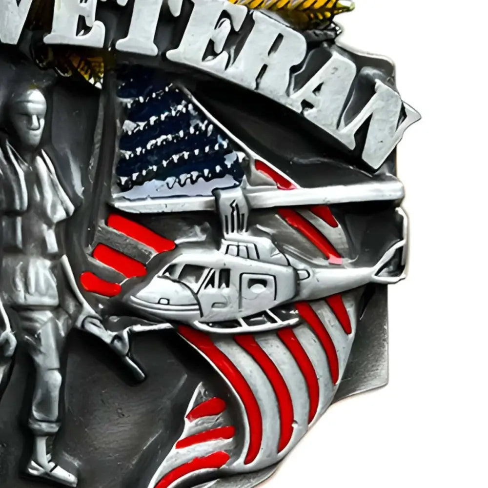 Vietnam Veteran belt buckle featuring silver-toned military figures and red stripes