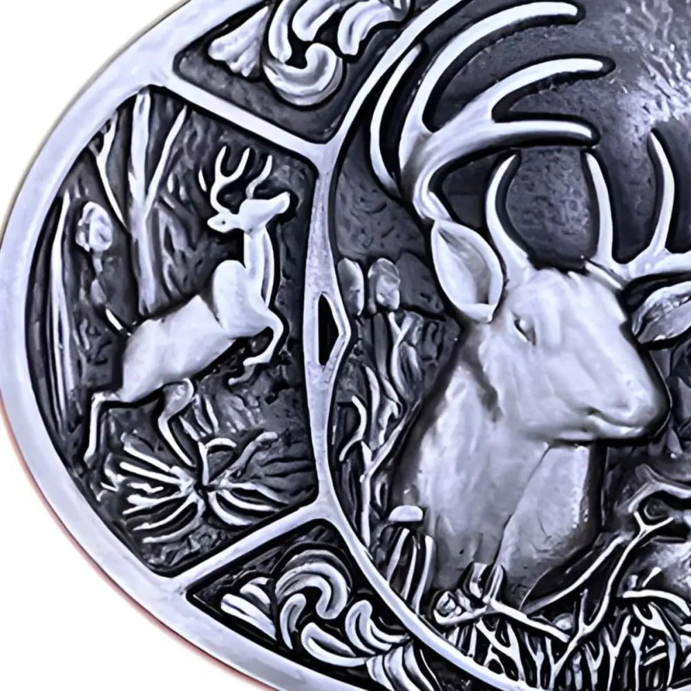 Silver deer medallion belt buckle featuring a detailed deer scene for elegant wear