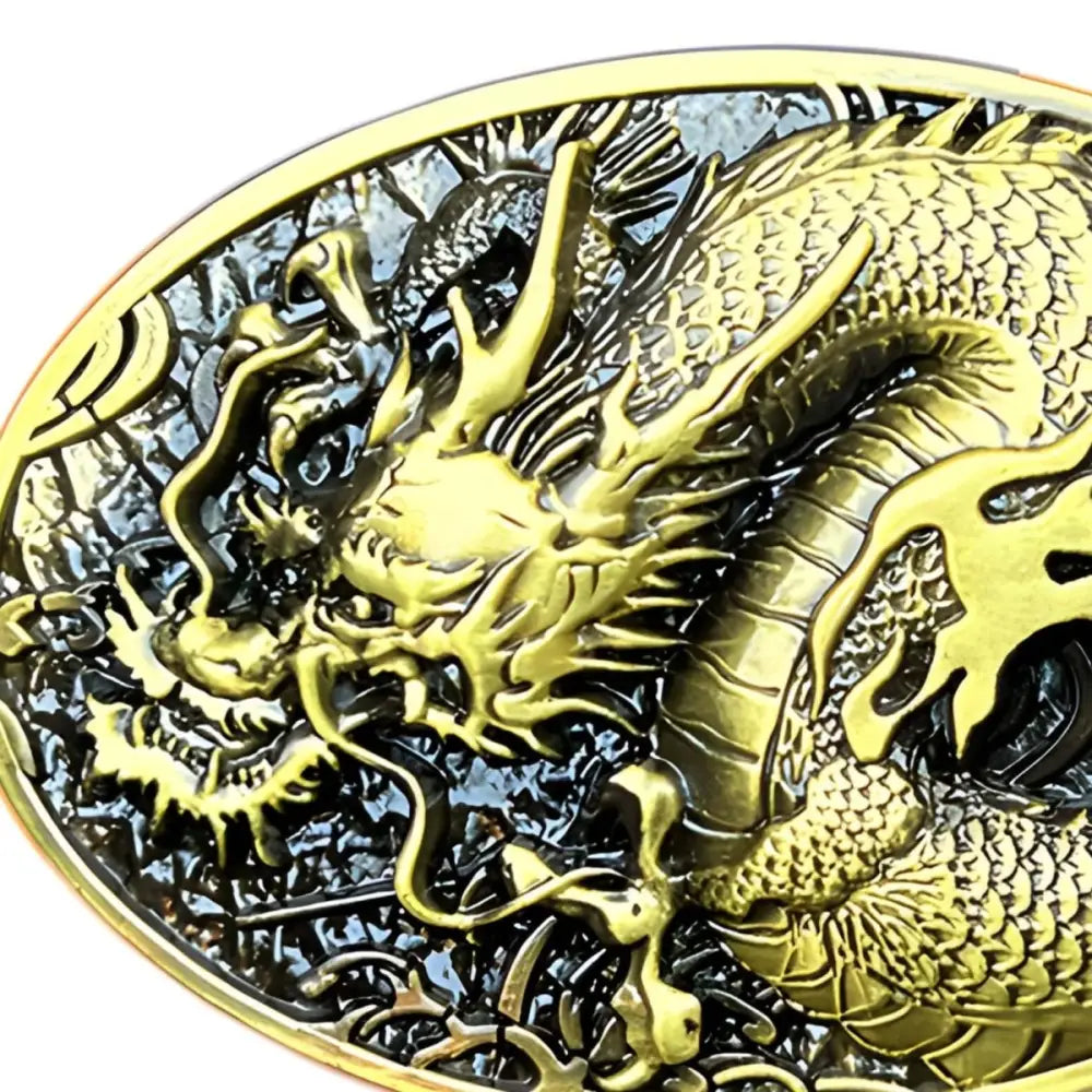 Ornate golden and silver dragon belt buckle with intricate detailing