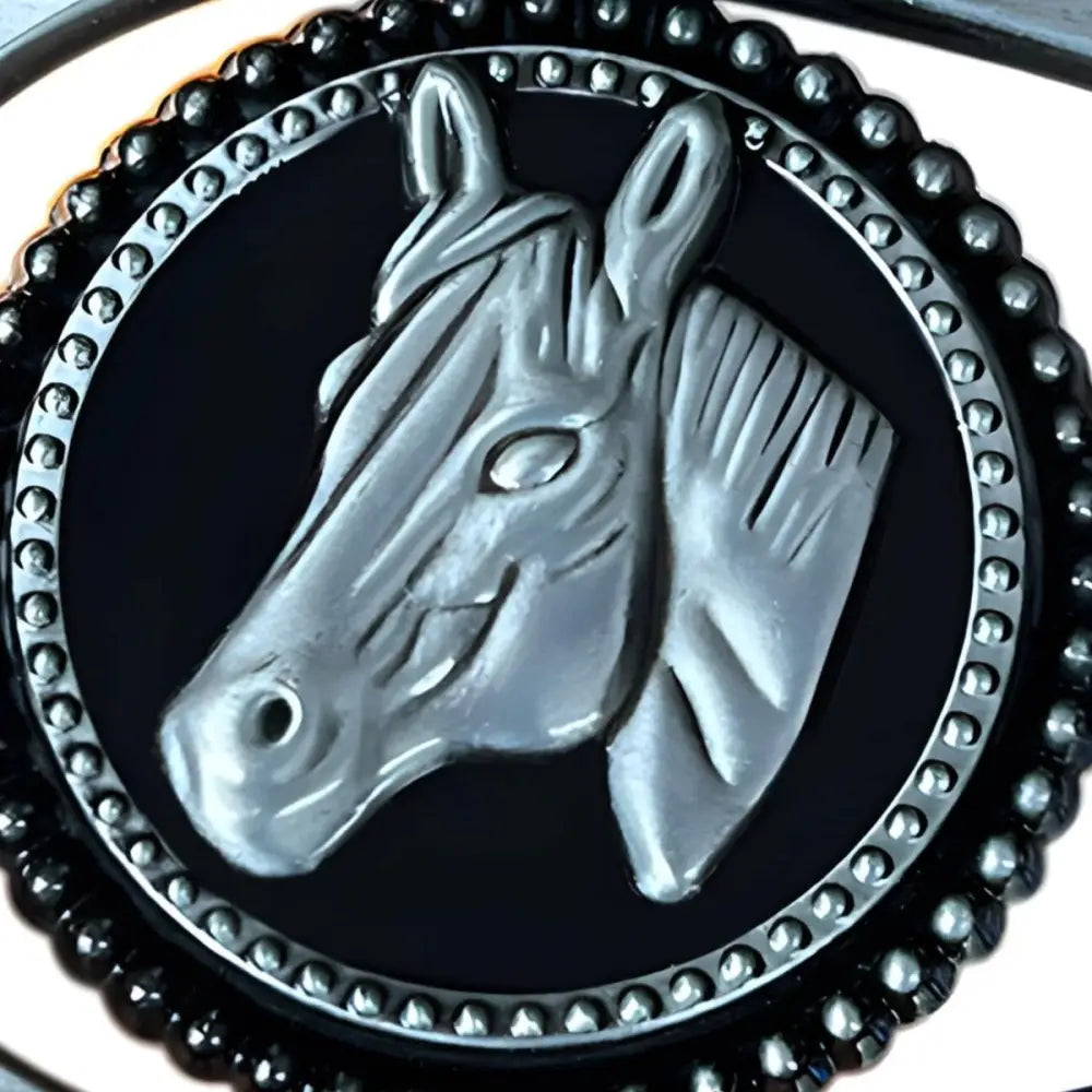 Silver horse head belt buckle for Western style boots showcasing intricate design