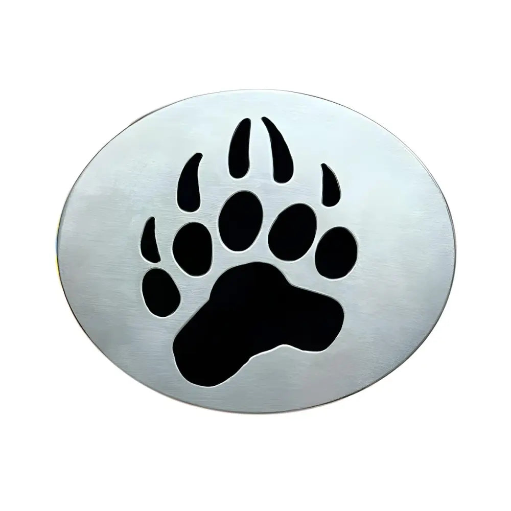 Oval metal bear paw cutout on silver drain cover with paw print and belt buckle design