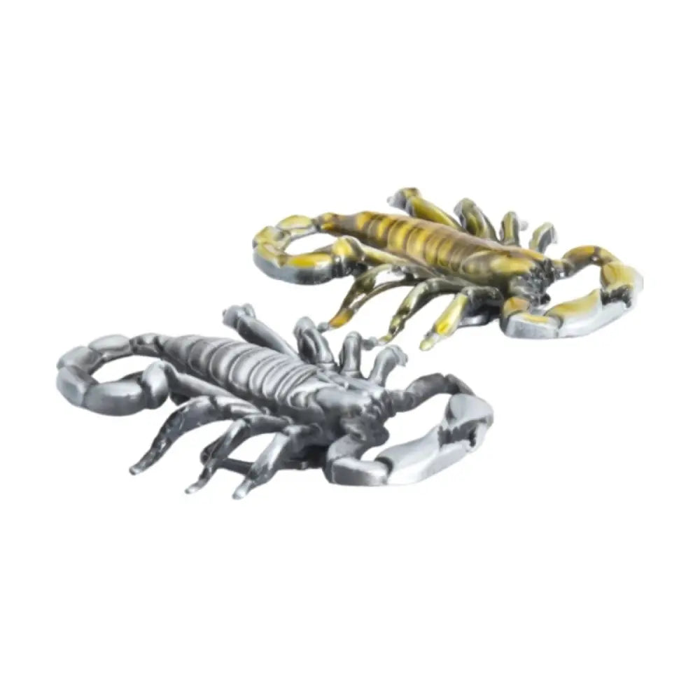 Metallic scorpion figurines and belt buckle set displayed in elegant arrangement