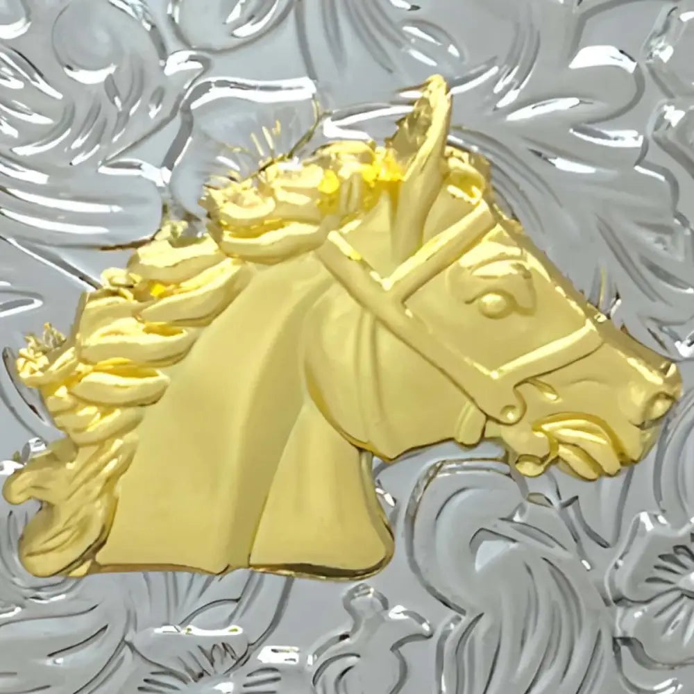 Gold horse head belt buckle with a silver floral background for sophisticated style