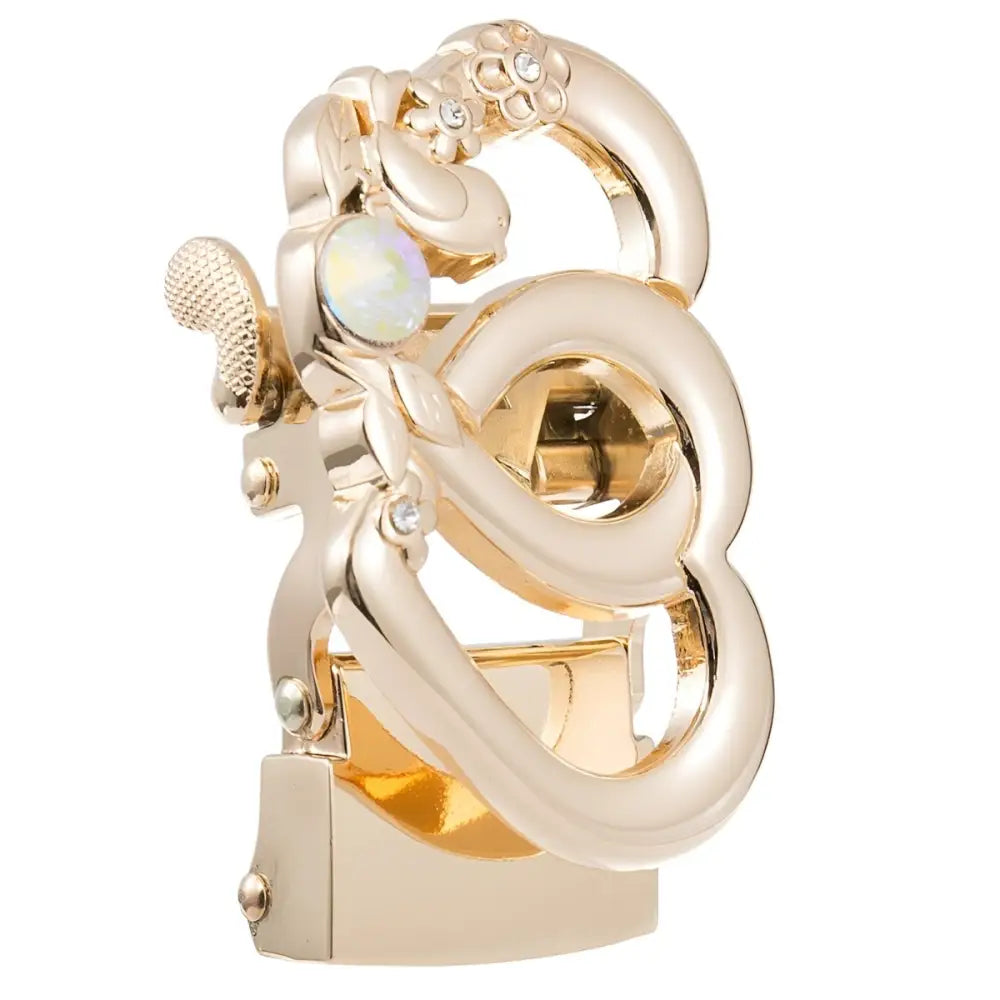 Gold-toned decorative belt buckle featuring rhinestones and floral details for elegant style