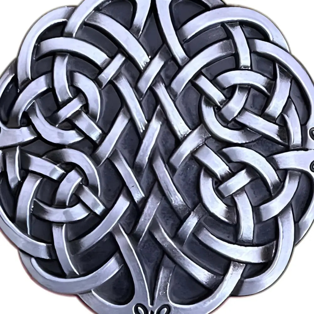 Intricate silver Celtic knot pendant showcasing detailed craftsmanship and elegant design